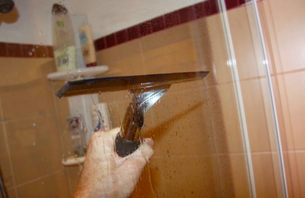 how do you clean sliding shower doors